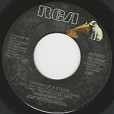Razzy Bailey - Loving Up A Storm/What's A Little Love Between Friends (US)