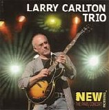 Larry Carlton Trio - New Morning: The Paris Concert (2008)